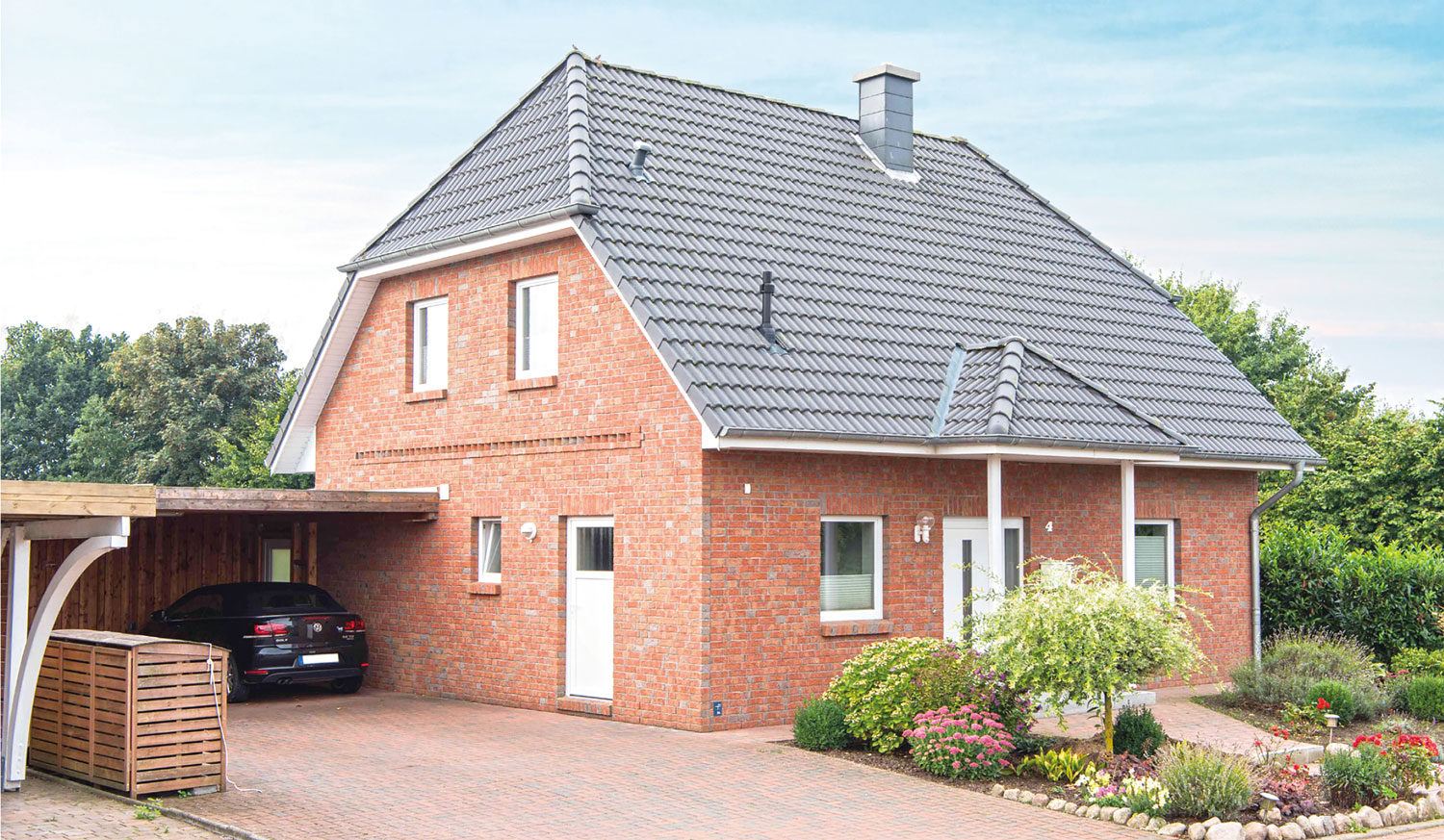 Haus Rieseby-Stein auf Stein gemauert, roter Klinkerstein-Satteldach